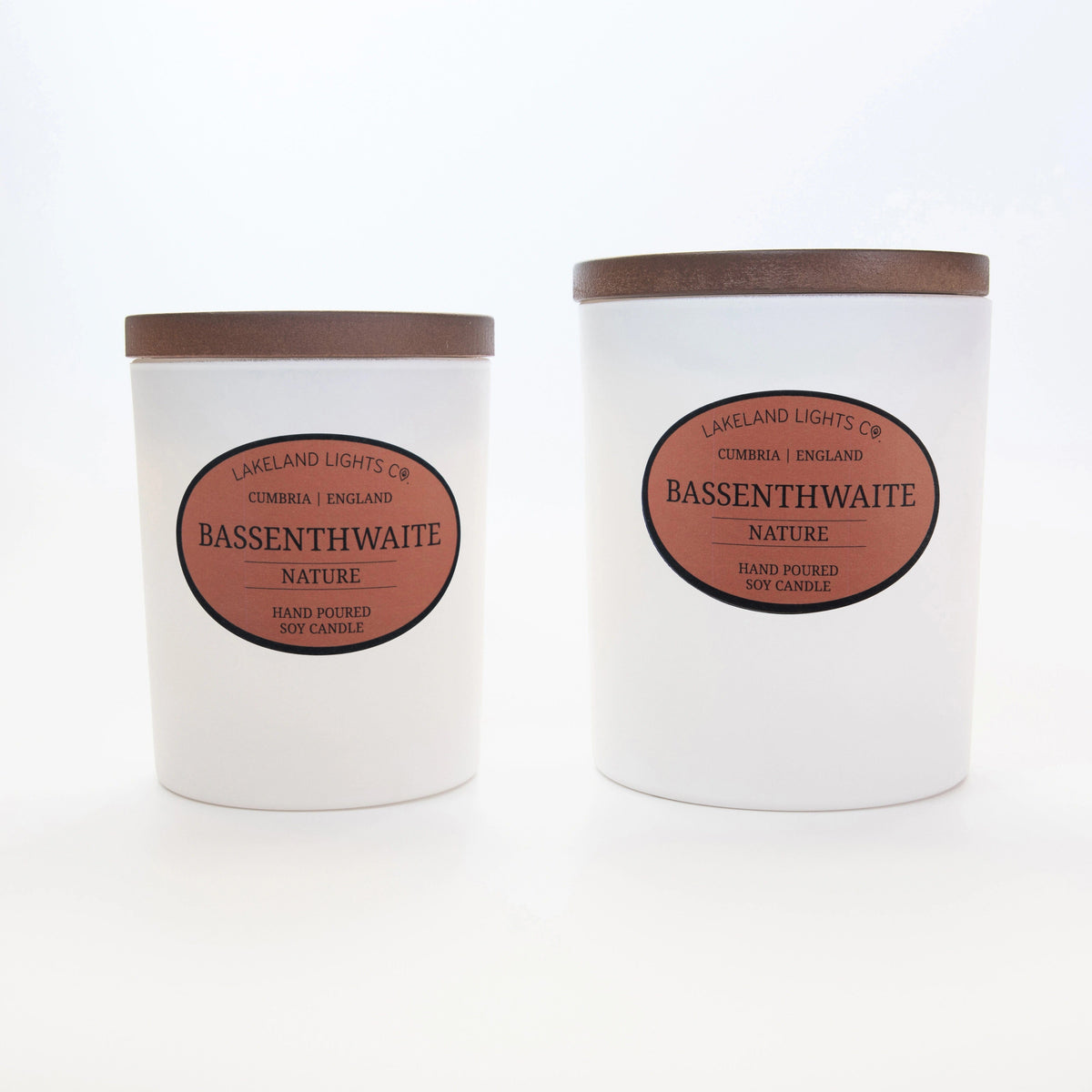 Bassenthwaite Nature soy candle by Lakeland Lights, featuring vetiver, black currant, and mulberry scent, next to its packaging box.