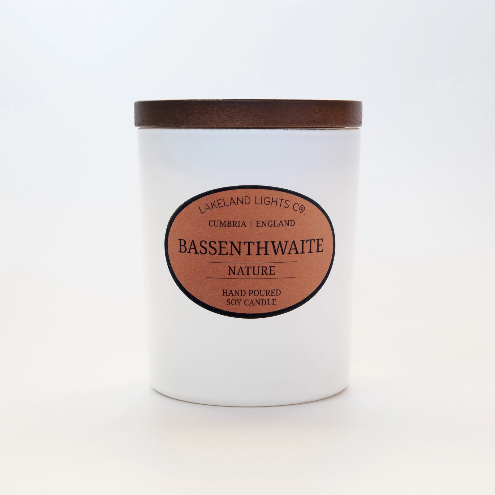 Bassenthwaite Nature soy candle by Lakeland Lights, showcasing the front label, featuring vetiver, black currant, and mulberry scent.